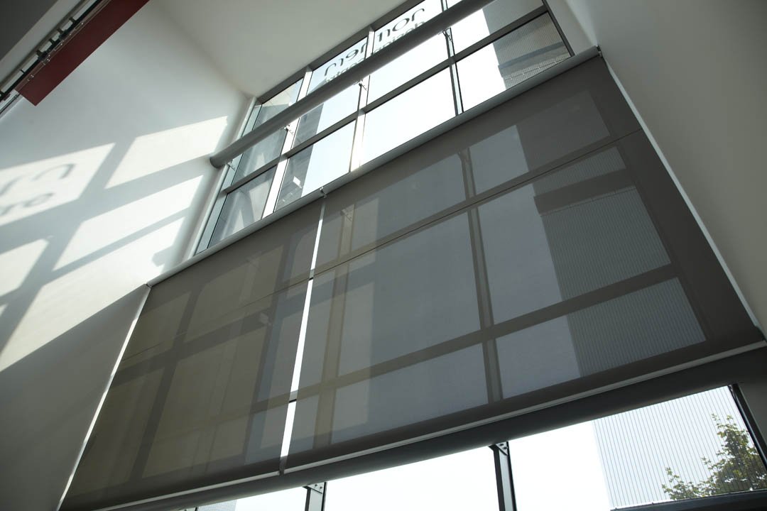 Roller Blinds vs. Vertical Blinds: Which Is Better for Your Business?